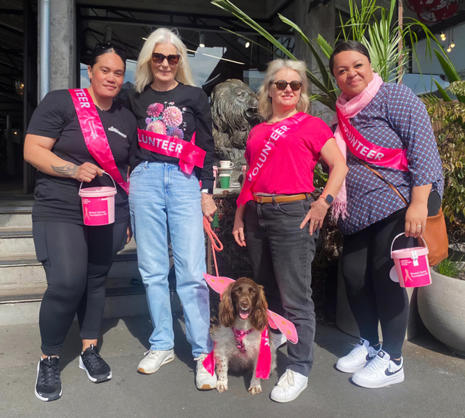 Group of Pink Ribbon Street Appeal volunteers with their dog