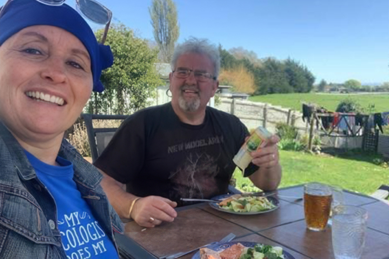 Pamela at home sharing a meal